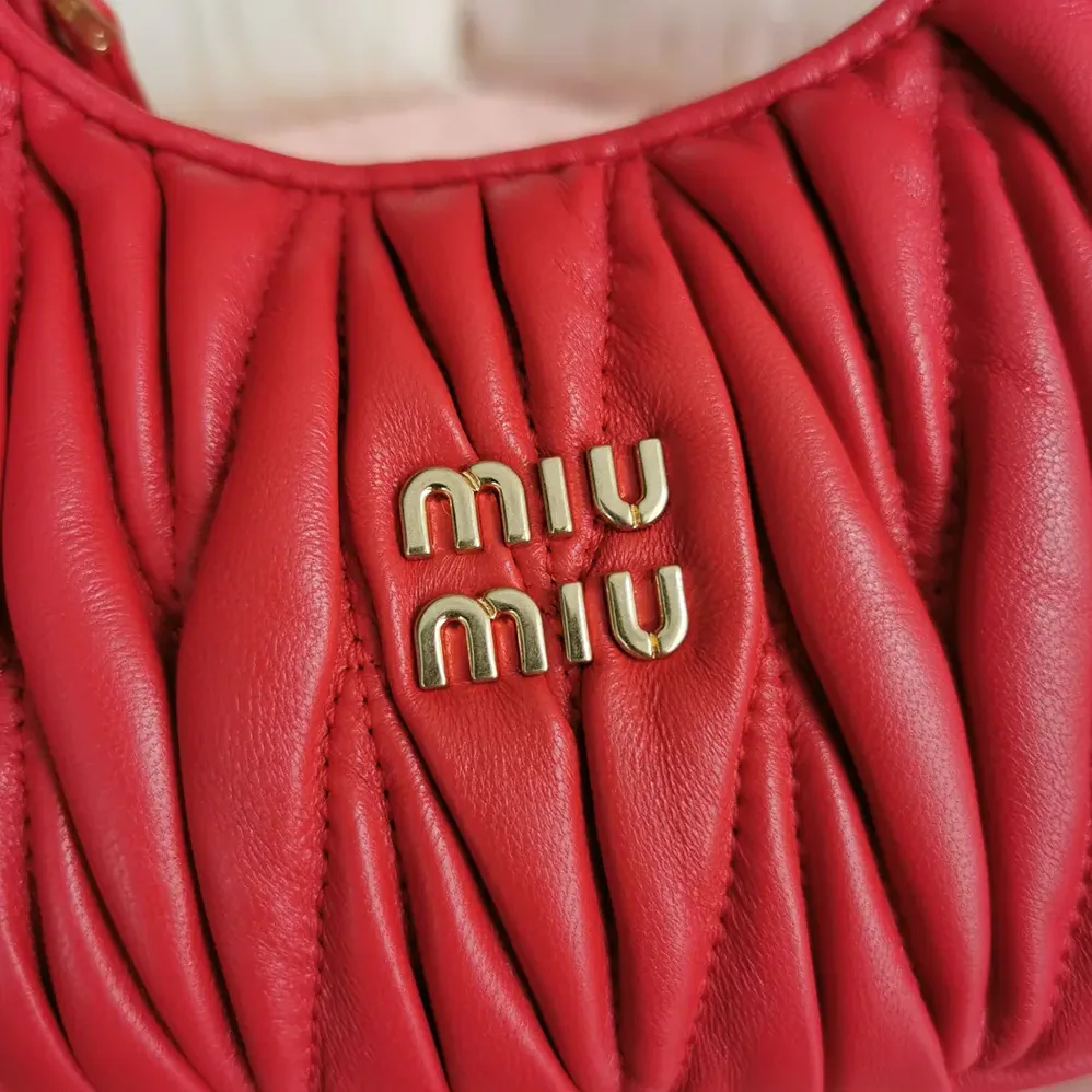 Miu Miu Wander Matelassé Nappa Leather Hobo Mini-Bag for Women in Red Miu Miu Wander Matelassé Nappa Leather Hobo Mini-Bag for Women in Red