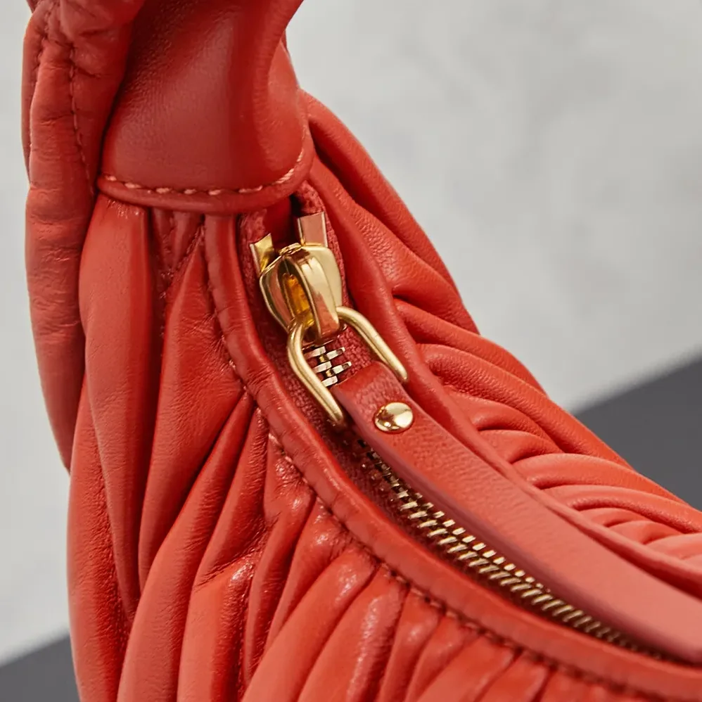 Miu Miu Wander Matelassé Nappa Leather Hobo Bag for Women in Orange Miu Miu Wander Matelassé Nappa Leather Hobo Bag for Women in Orange