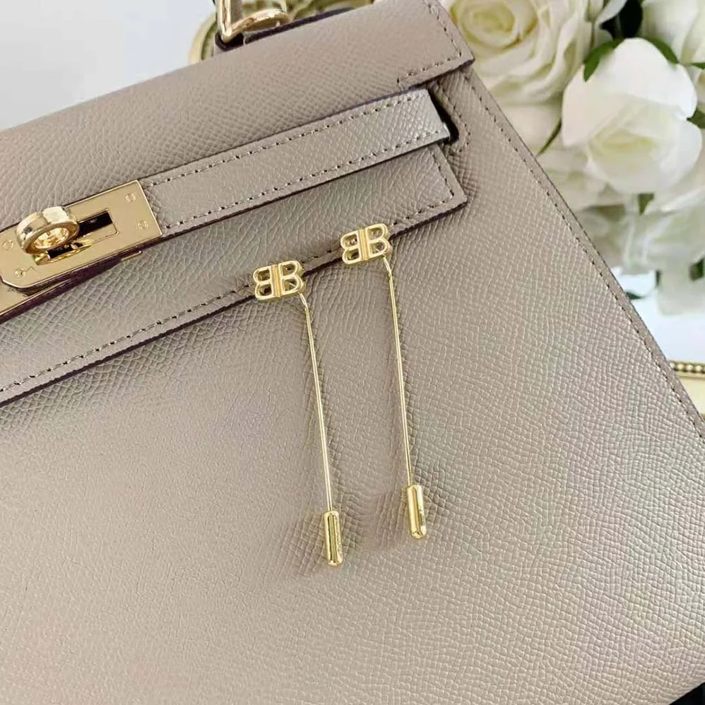 Balenciaga Pin BB Earrings in Shiny Gold Brass and Bronze for Women