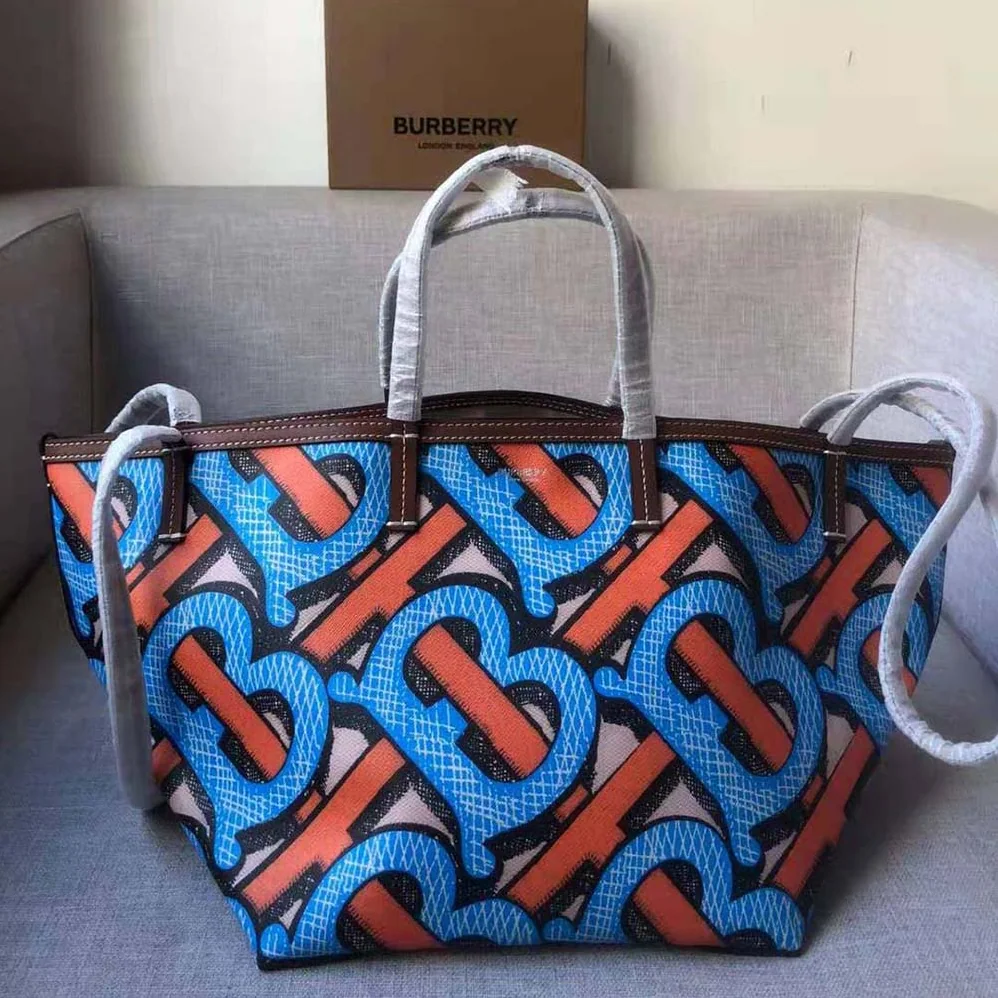Burberry Mini Monogram Print E-canvas Beach Tote for Women in Orange