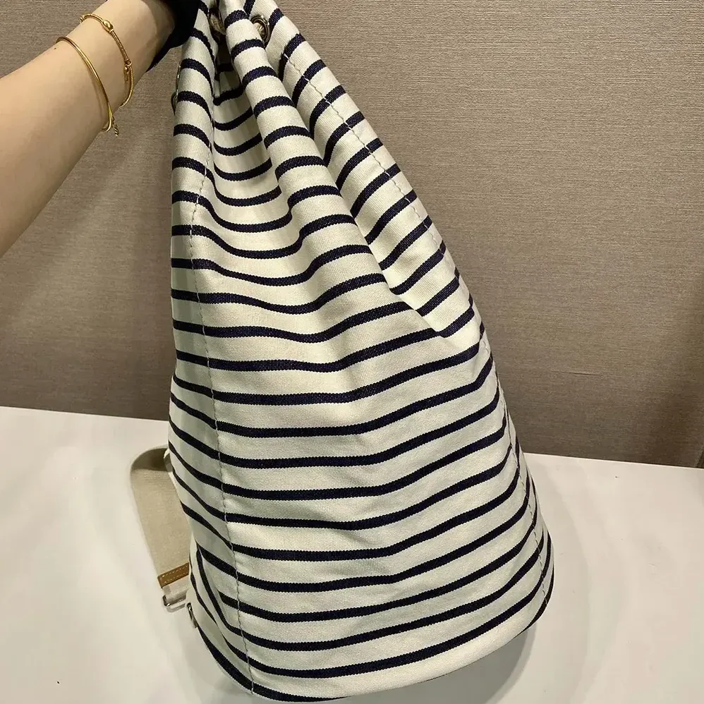 Prada Striped Canvas Drawstring Duffel Bag for Unisex in White