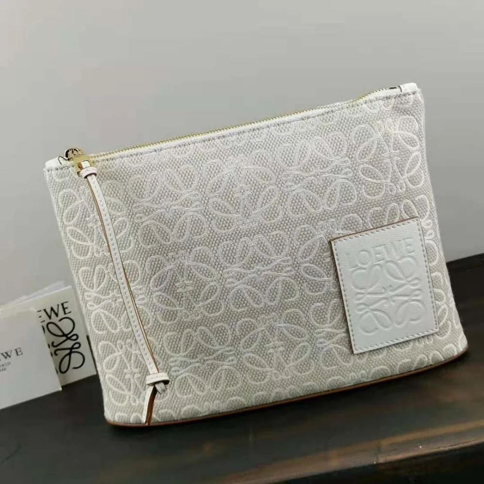 Loewe Oblong Anagram Pouch in Jacquard and Calfskin for Women in White Loewe Oblong Anagram Pouch in Jacquard and Calfskin for Women in White