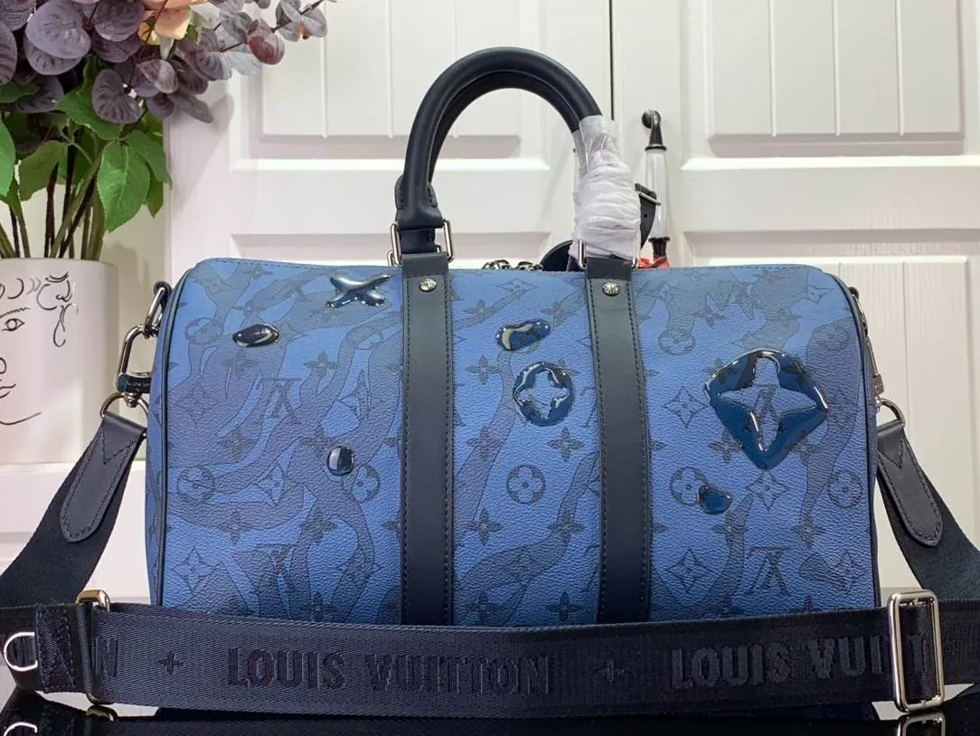 Louis Vuitton Keepall Bandouliere 35 Travel Bag in Blue Silver Hardware