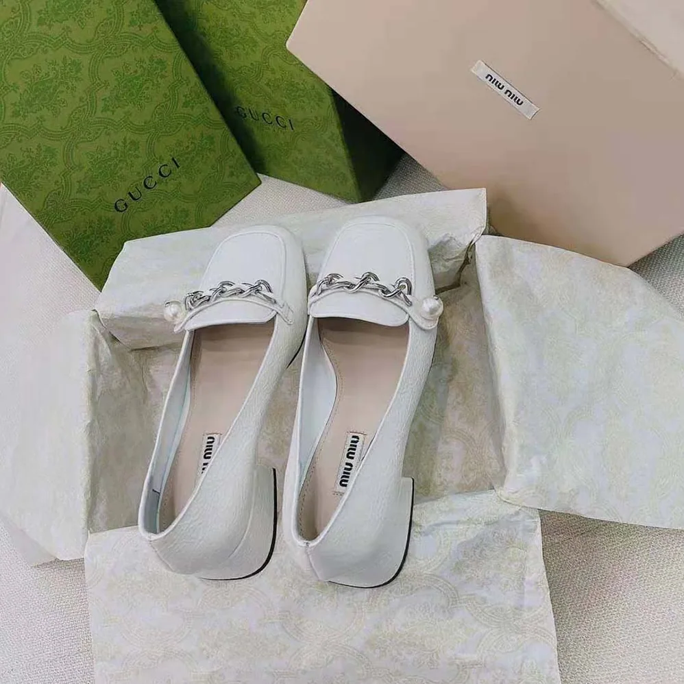 Miu Miu Patent Leather Loafers in 35mm Heel for Women in White Miu Miu Patent Leather Loafers in 35mm Heel for Women in White
