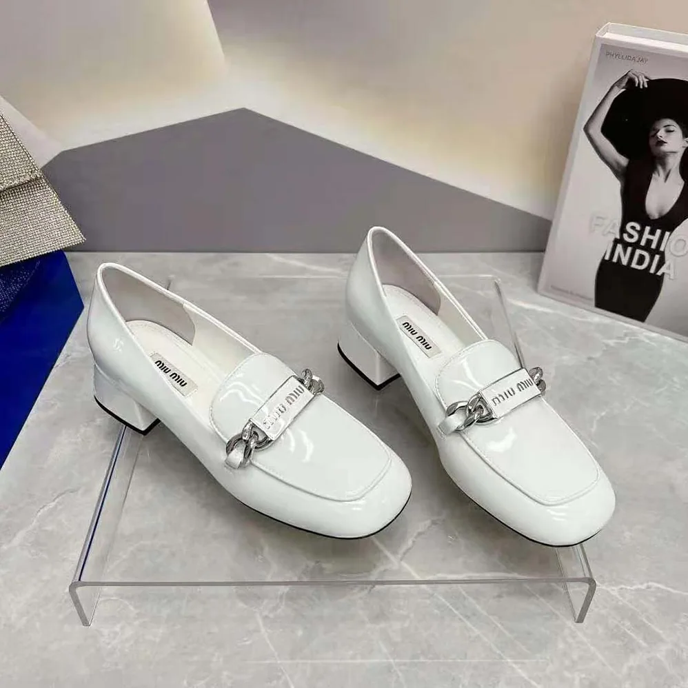 Miu Miu Patent Leather Loafers in 35 mm Heel Height for Women in White Miu Miu Patent Leather Loafers in 35 mm Heel Height for Women in White