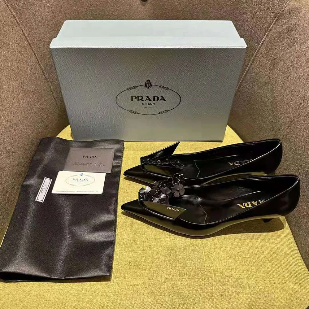 Prada Brushed Leather Pumps with Floral Appliqués for Women in Black