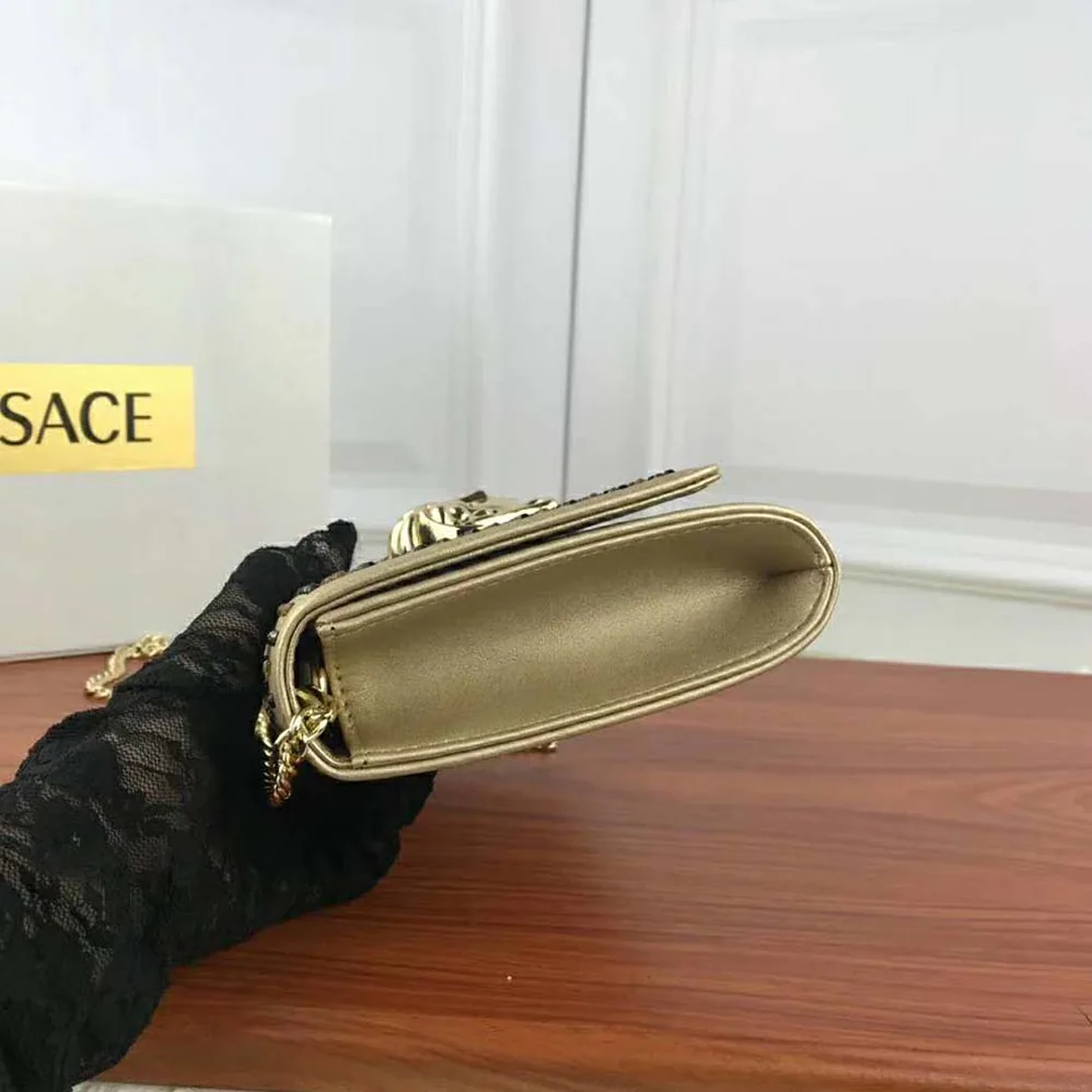 Versace Laminated Palazzo Evening Bag for Women in Gold Versace Laminated Palazzo Evening Bag for Women in Gold
