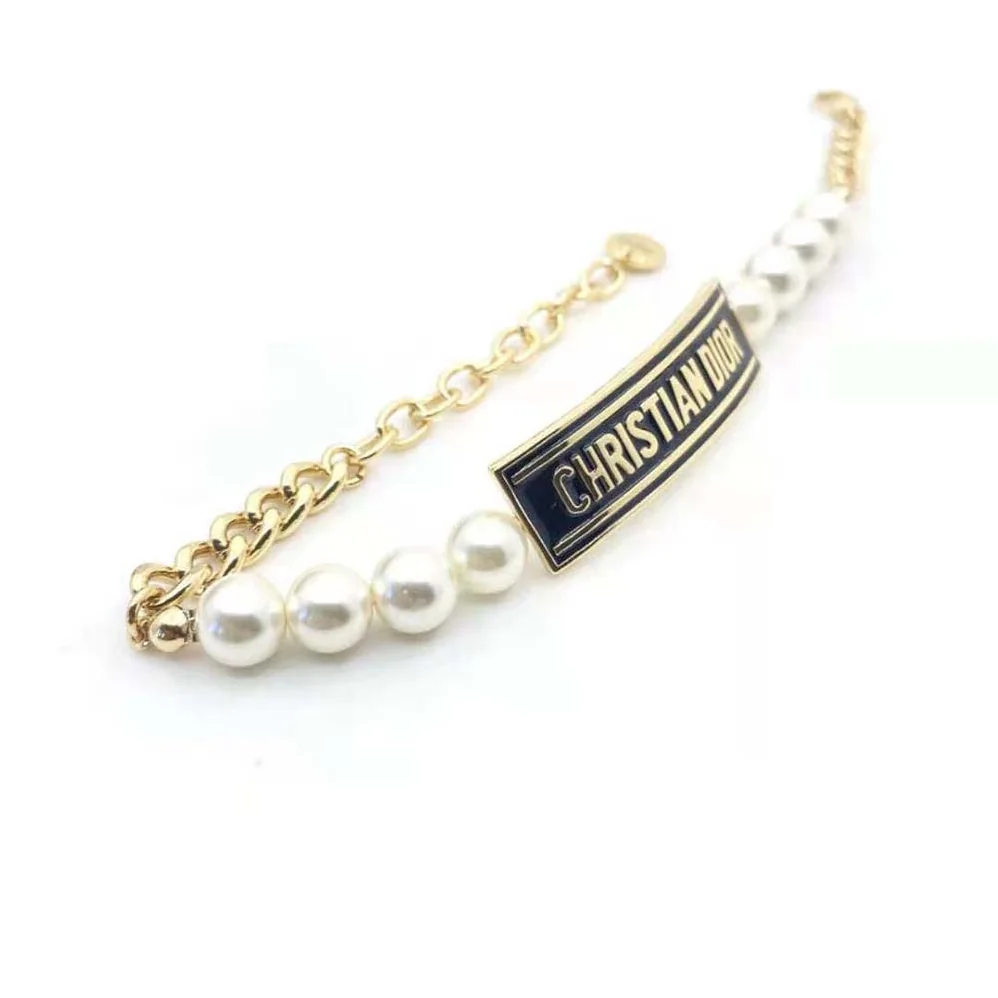 Dior Dior-id Bracelet Gold-Finish Metal with White Resin Pearls and Black Lacquer for Women Dior Dior-id Bracelet Gold-Finish Metal with White Resin Pearls and Black Lacquer for Women