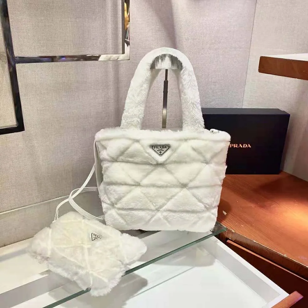 Prada Iconic Triangle Logo Soft Shearling Tote for Women in White Prada Iconic Triangle Logo Soft Shearling Tote for Women in White
