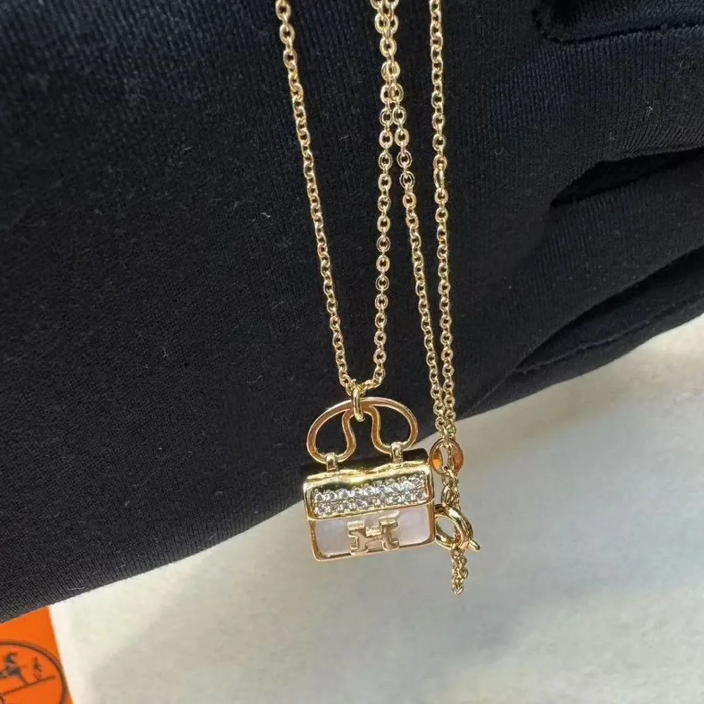 Hermes Amulettes Constance Necklace Gold Tone Hermes Amulettes Constance Necklace Gold Tone