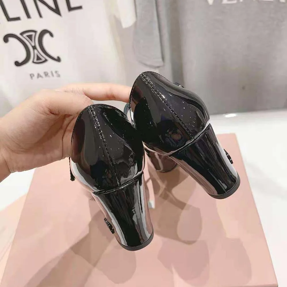 Miu Miu Patent Leather Pumps with Metal Lettering Logo for Women in Black Miu Miu Patent Leather Pumps with Metal Lettering Logo for Women in Black