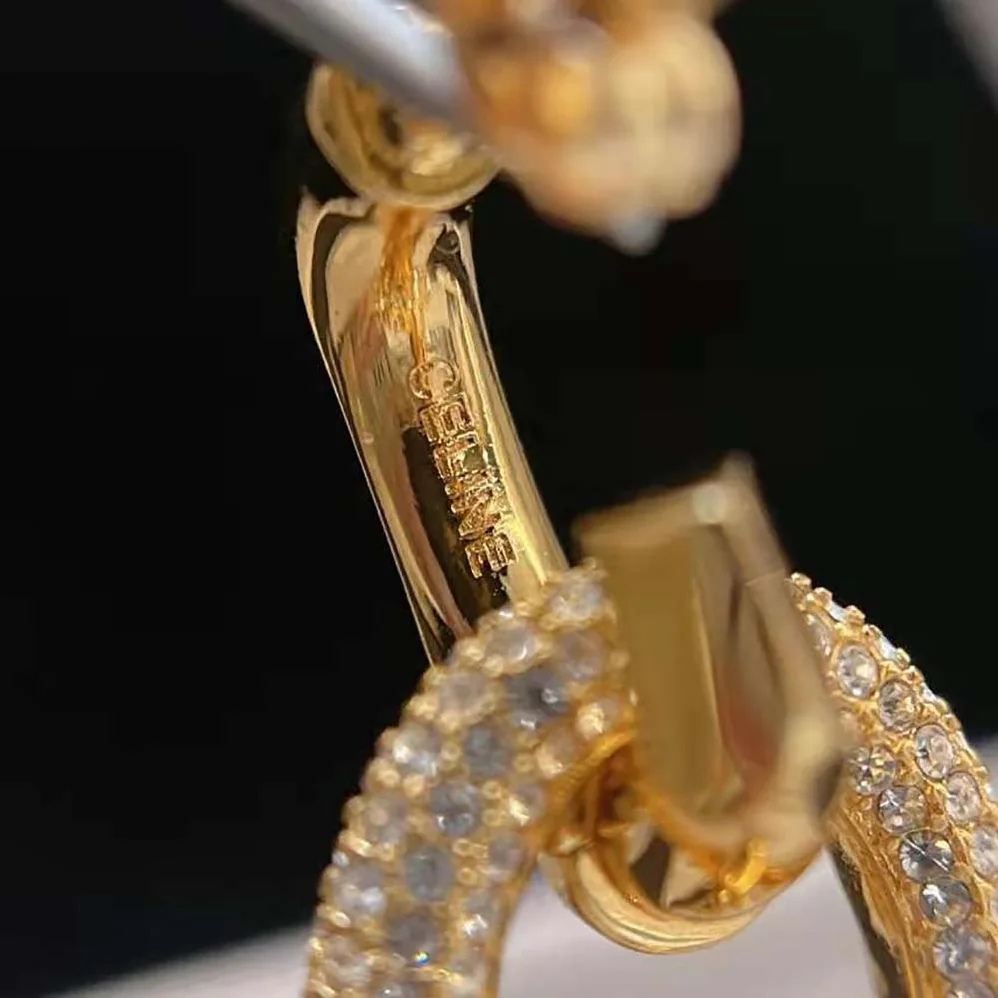 Celine Le Soir Chain Earrings in Brass with Gold Finish and Crystals for Women Celine Le Soir Chain Earrings in Brass with Gold Finish and Crystals for Women