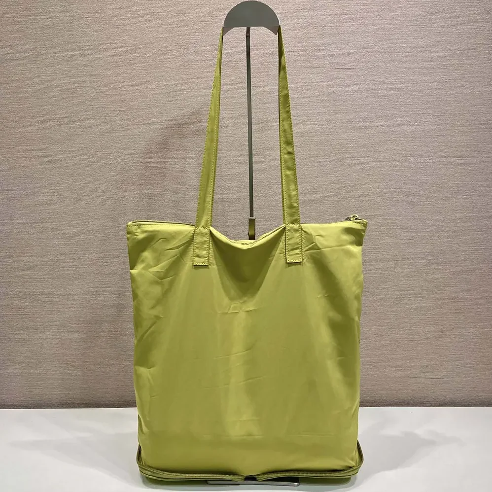 Prada Saffiano Leather Pendant With Re-Nylon Tote Bag for Women in Green Prada Saffiano Leather Pendant With Re-Nylon Tote Bag for Women in Green