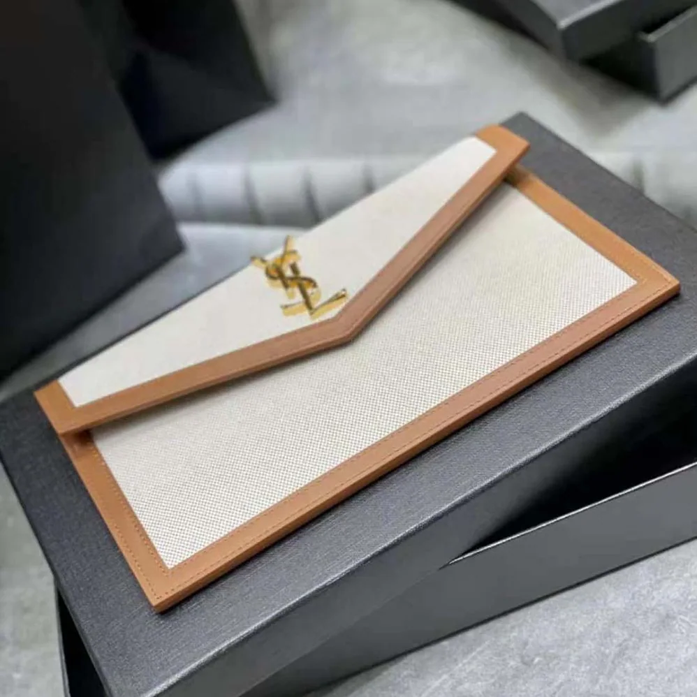Saint Laurent YSL Uptown Pouch in Canvas and Smooth Leather for Women