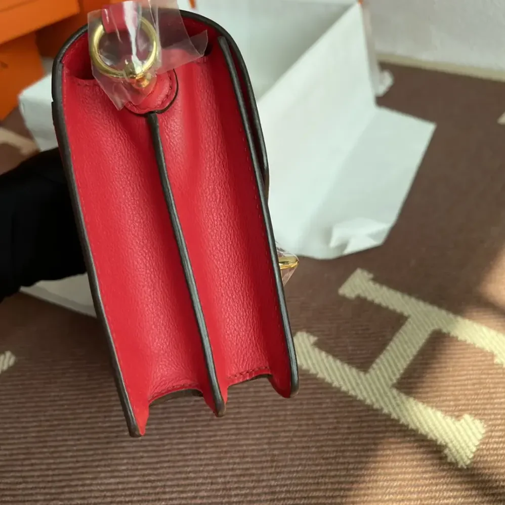 Hermes Roulis Mini Bag in Evercolor Calfskin for Women in Red/Gold