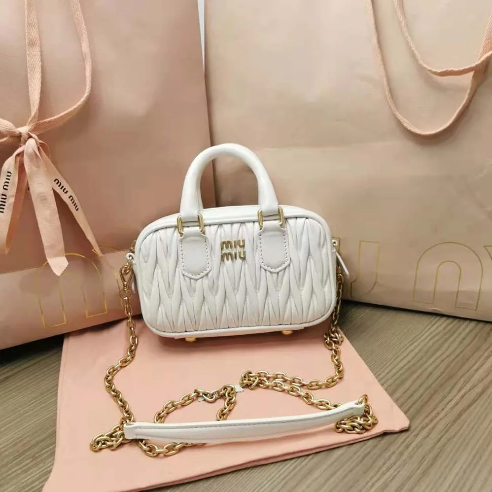 Miu Miu Matelassé Nappa Leather Top-Handle Mini-Bag for Women in White Miu Miu Matelassé Nappa Leather Top-Handle Mini-Bag for Women in White