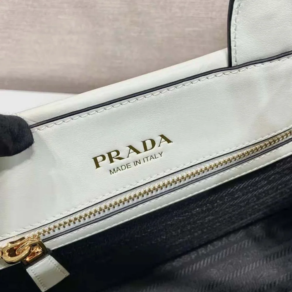 Prada Mini Prada Symbole Leather Bag with Stitching for Women in White