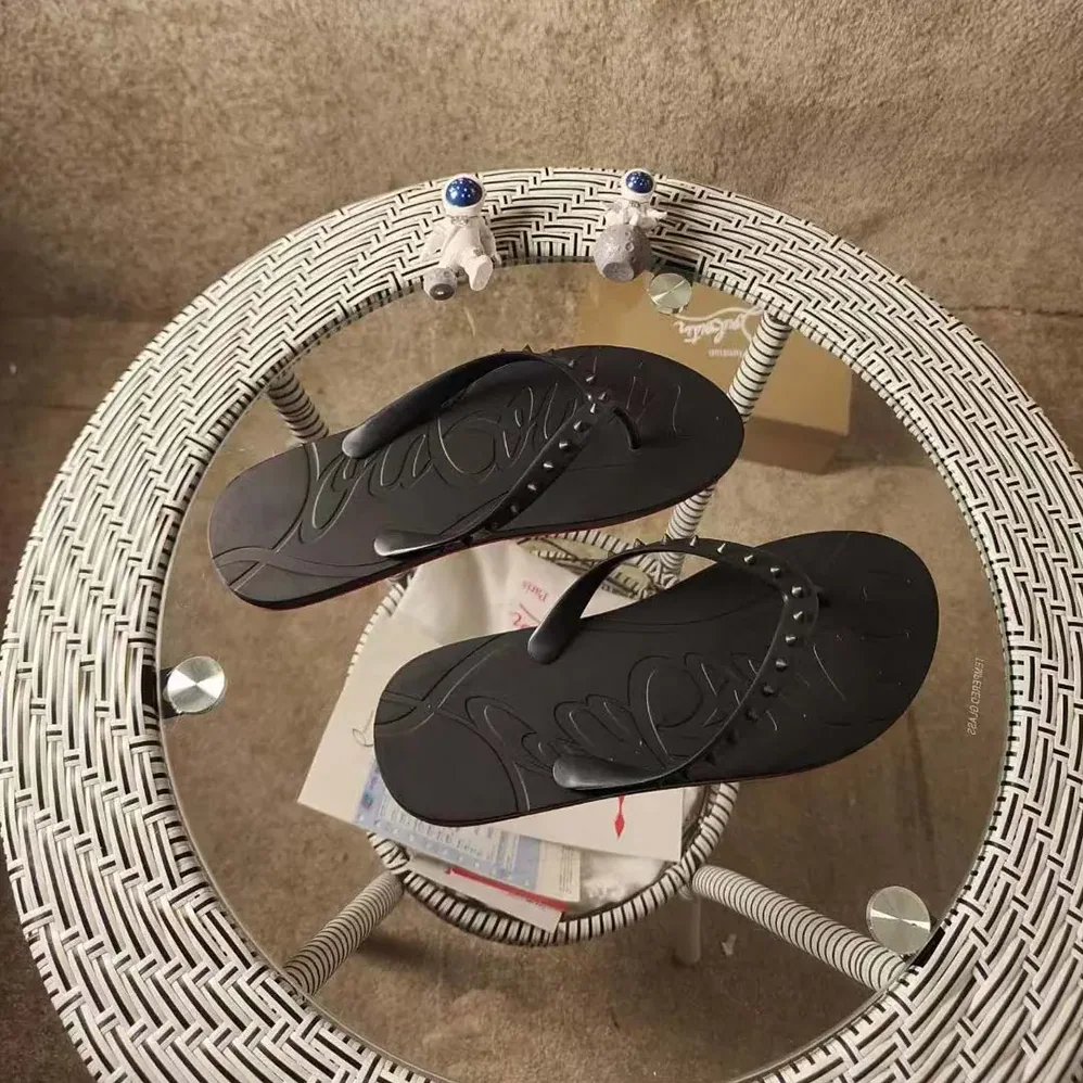 Christian Louboutin Loubi Donna Spike Red Sole Flip Flops for Men in Black Christian Louboutin Loubi Donna Spike Red Sole Flip Flops for Men in Black