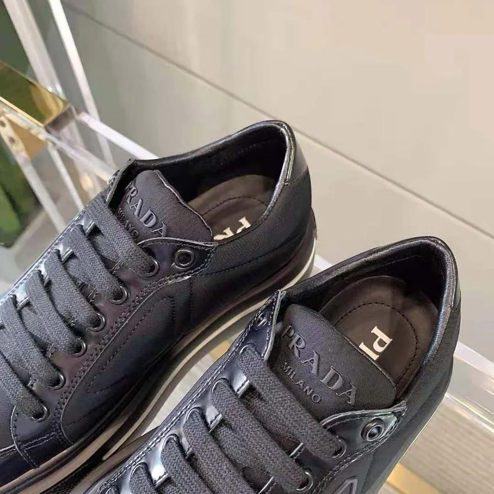 Prada Macro Re-Nylon and Brushed Leather Sneakers for Women in Black