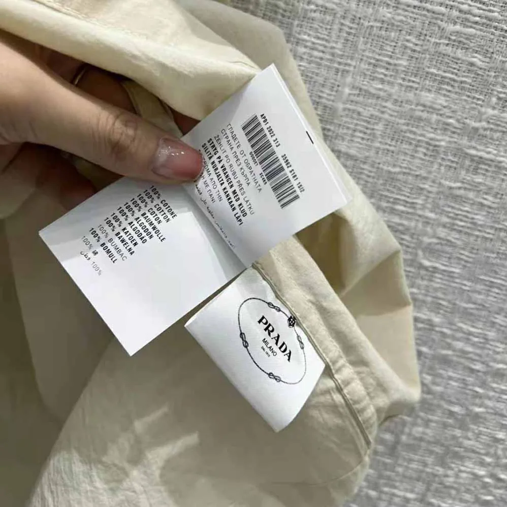 Prada Printed Canvas Dress is Decorated with Motifs Made for Women Prada Printed Canvas Dress is Decorated with Motifs Made for Women