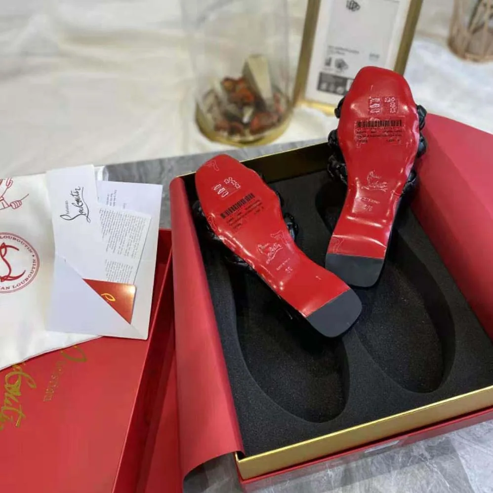 Christian Louboutin Marmela Flat Mule is Modern and Elegant for Women in Black