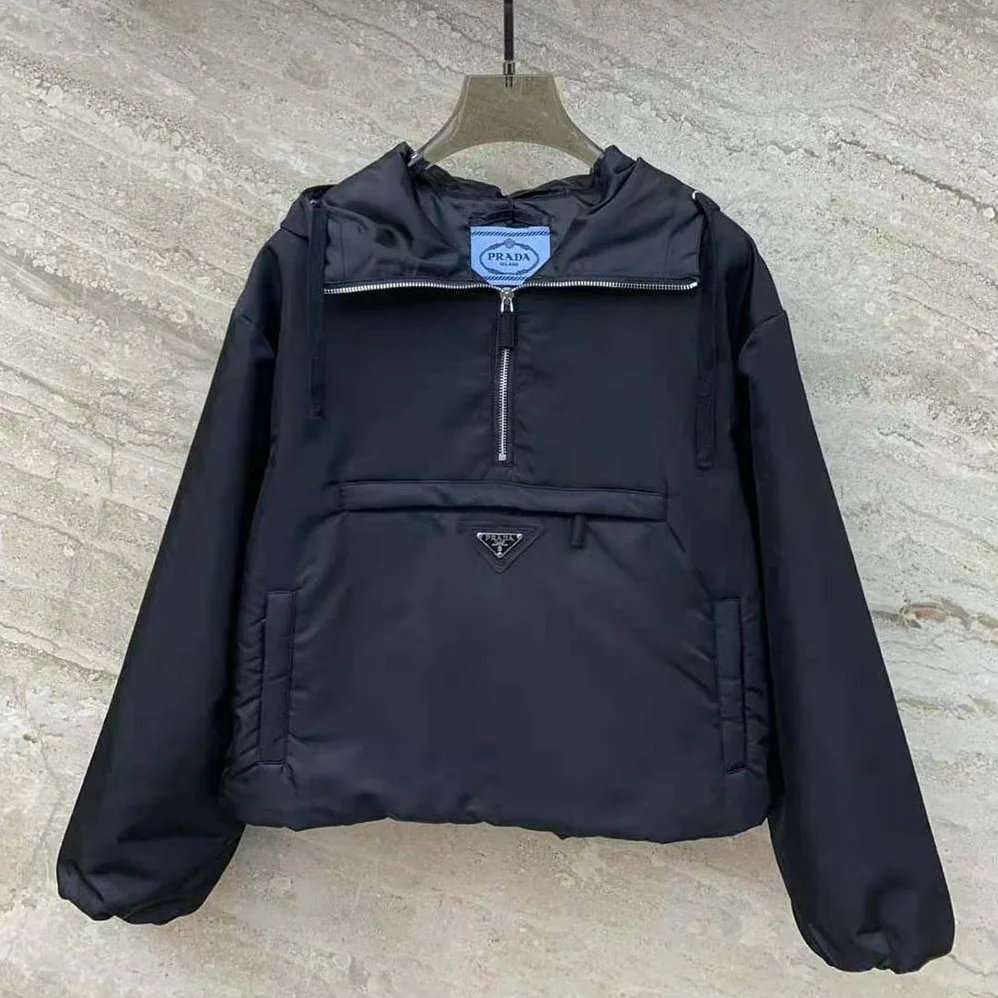 Prada Re-Nylon Blouson Jacket with Enameled Metal Triangle Logo for Women in Black Prada Re-Nylon Blouson Jacket with Enameled Metal Triangle Logo for Women in Black