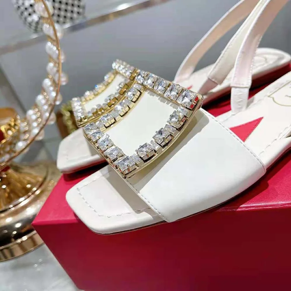 Roger Vivier Biki Love Strass Buckle Sandals in Leather for Women in White
