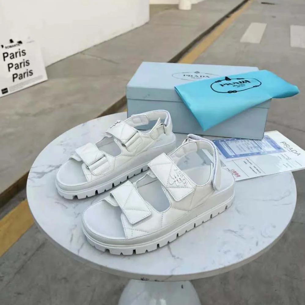 Prada Padded Nappa Leather Sandals for Women in White