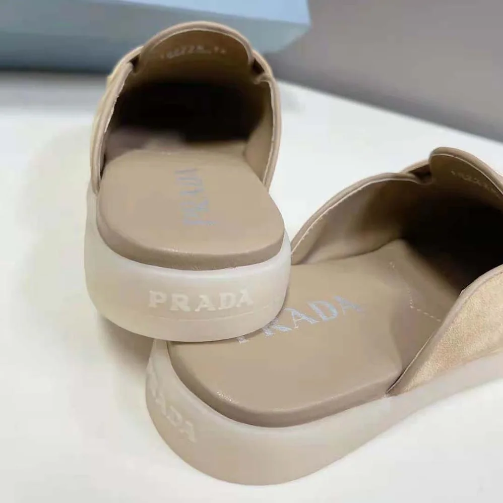 Prada Suede Leather Sabots with Enameled Metal Triangle Logo for Unisex in Brown