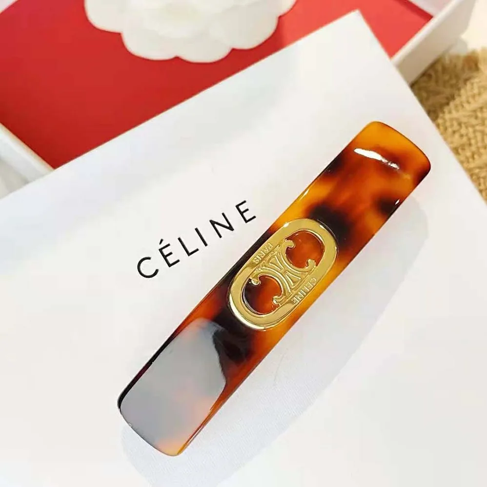 Celine Maillon Triomphe Hair Clip in Gold Brass Acetate and Steel for Women