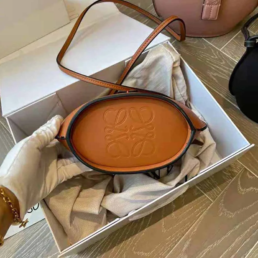 Loewe Moulded Bucket Bag in Calfskin for Women in Brown