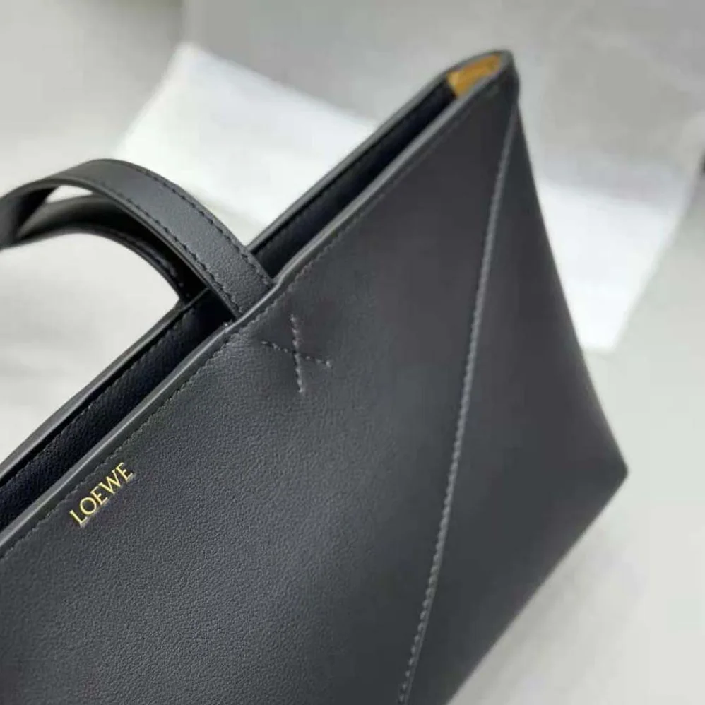 Loewe Cropped Puzzle Fold Bag in Shiny Calfskin for Women in Black Loewe Cropped Puzzle Fold Bag in Shiny Calfskin for Women in Black