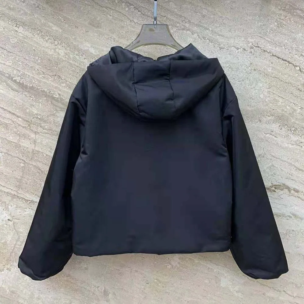 Prada Re-Nylon Blouson Jacket with Enameled Metal Triangle Logo for Women in Black Prada Re-Nylon Blouson Jacket with Enameled Metal Triangle Logo for Women in Black