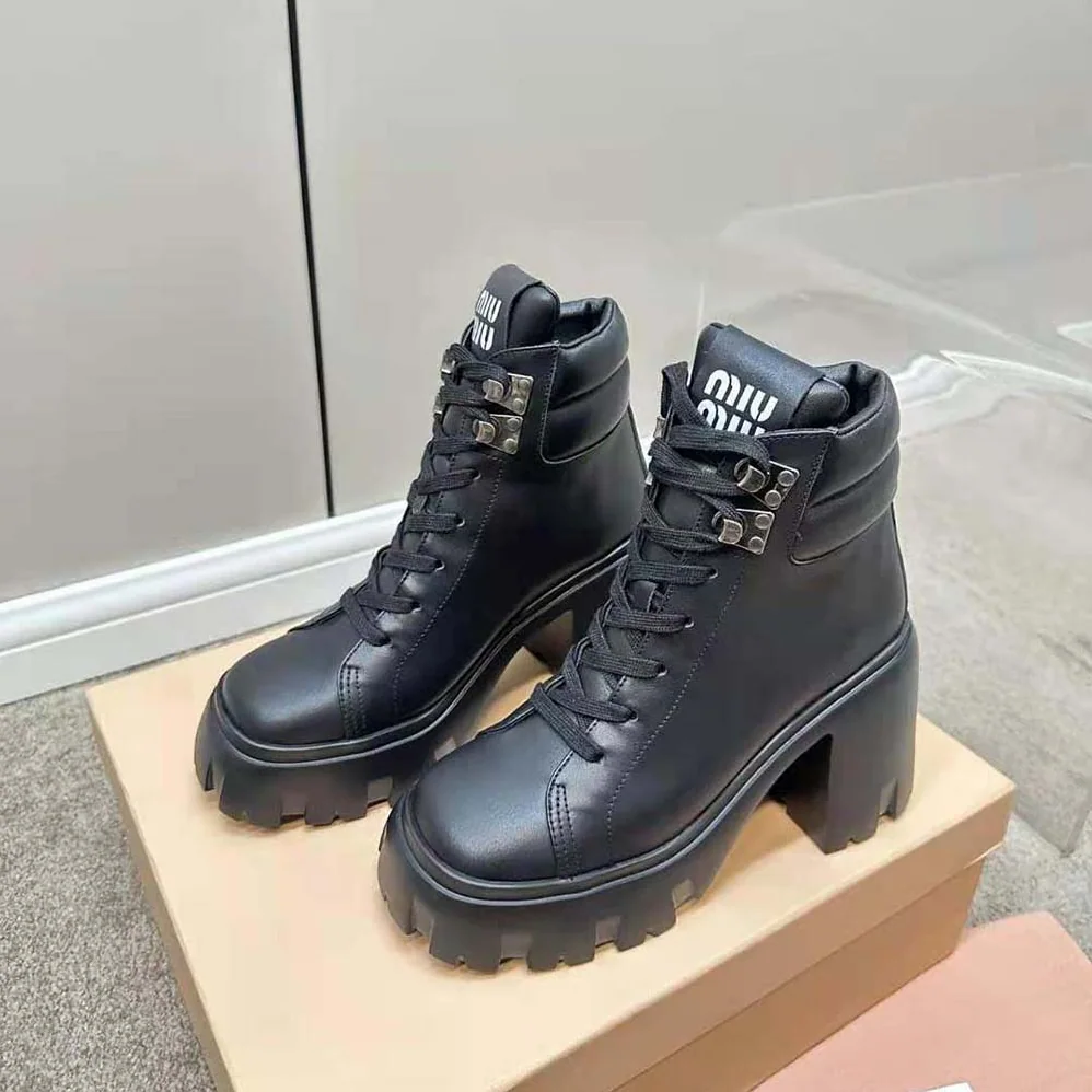 Miu Miu Leather Booties with EVA Sole with Logo for Women in Black Miu Miu Leather Booties with EVA Sole with Logo for Women in Black