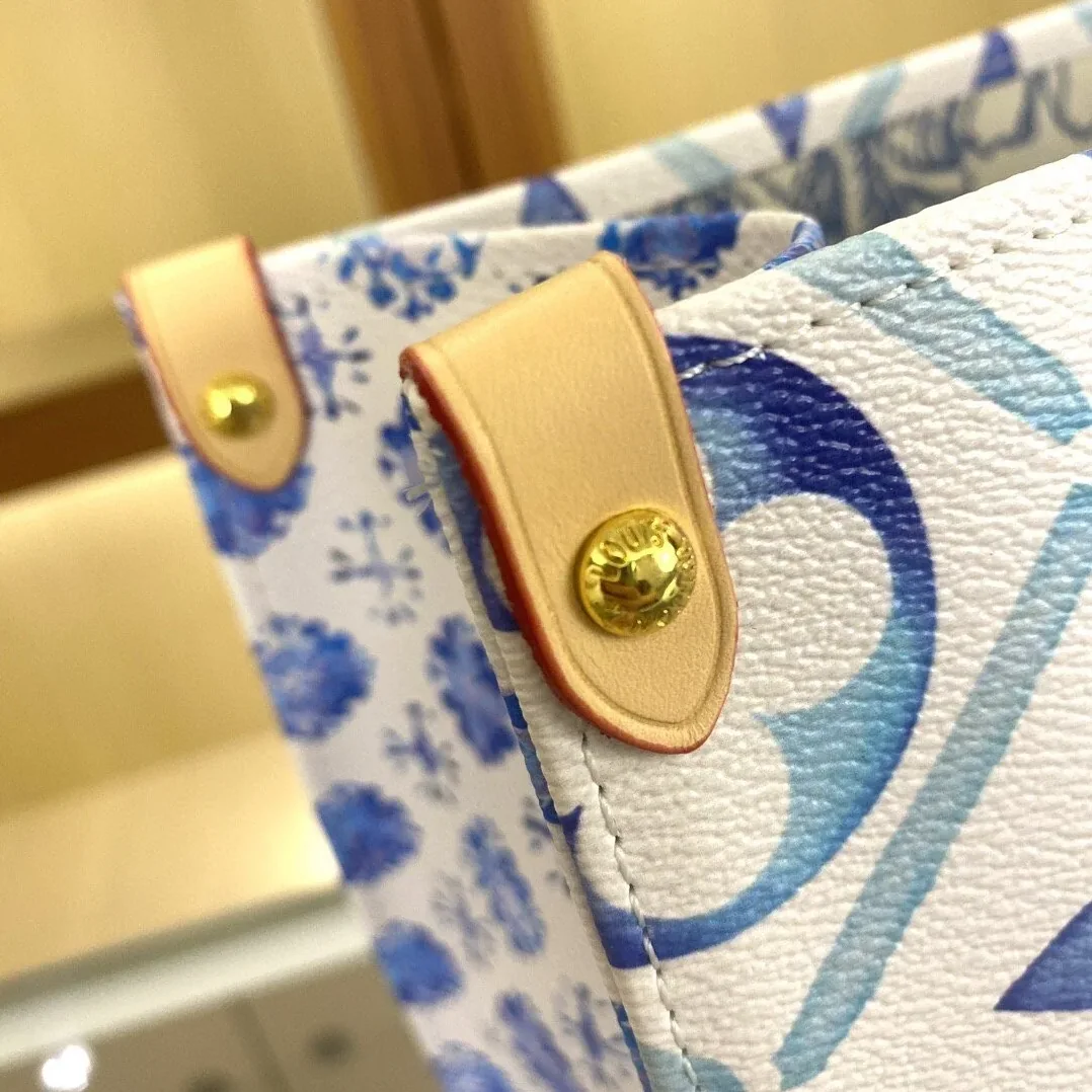 Louis Vuitton OnTheGo MM Tote Bag in Blue Gold Hardware