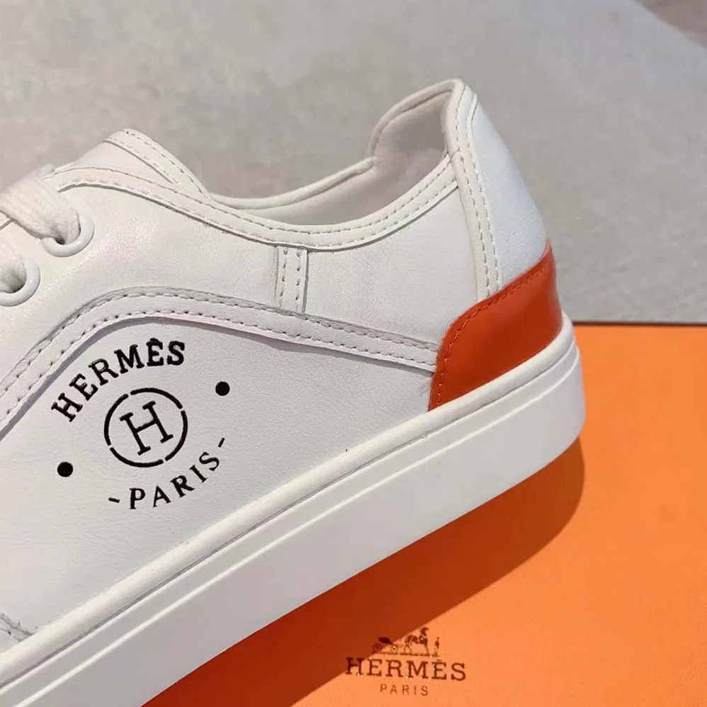 Hermes Get Sneaker in Calfskin with Signature “Hermès Paris” Stencil for Unisex in White Hermes Get Sneaker in Calfskin with Signature “Hermès Paris” Stencil for Unisex in White