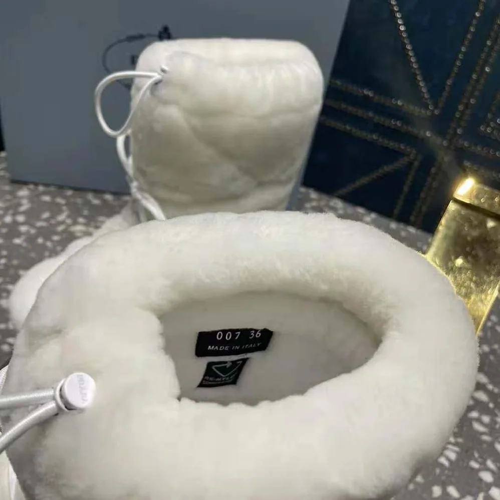 Prada Shearling Apres-ski Boots for Women in White