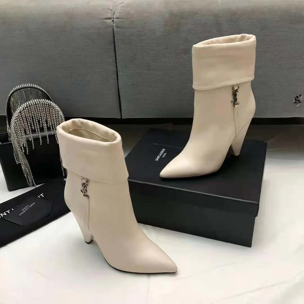 Saint Laurent YSL Niki Booties in Smooth Leather and Silver-Tone Monogram for Women in White Saint Laurent YSL Niki Booties in Smooth Leather and Silver-Tone Monogram for Women in White