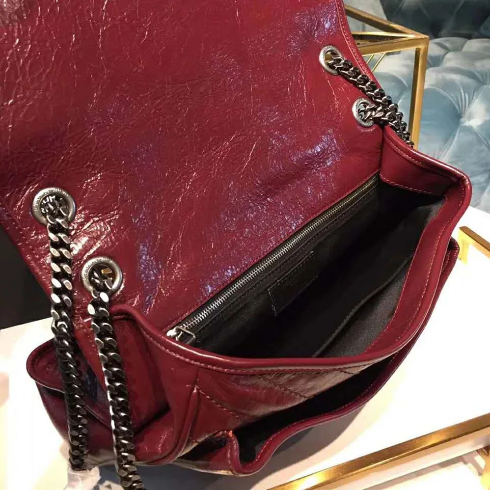 Saint Laurent YSL Niki Large in Vintage Leather for Women in Maroon Saint Laurent YSL Niki Large in Vintage Leather for Women in Maroon