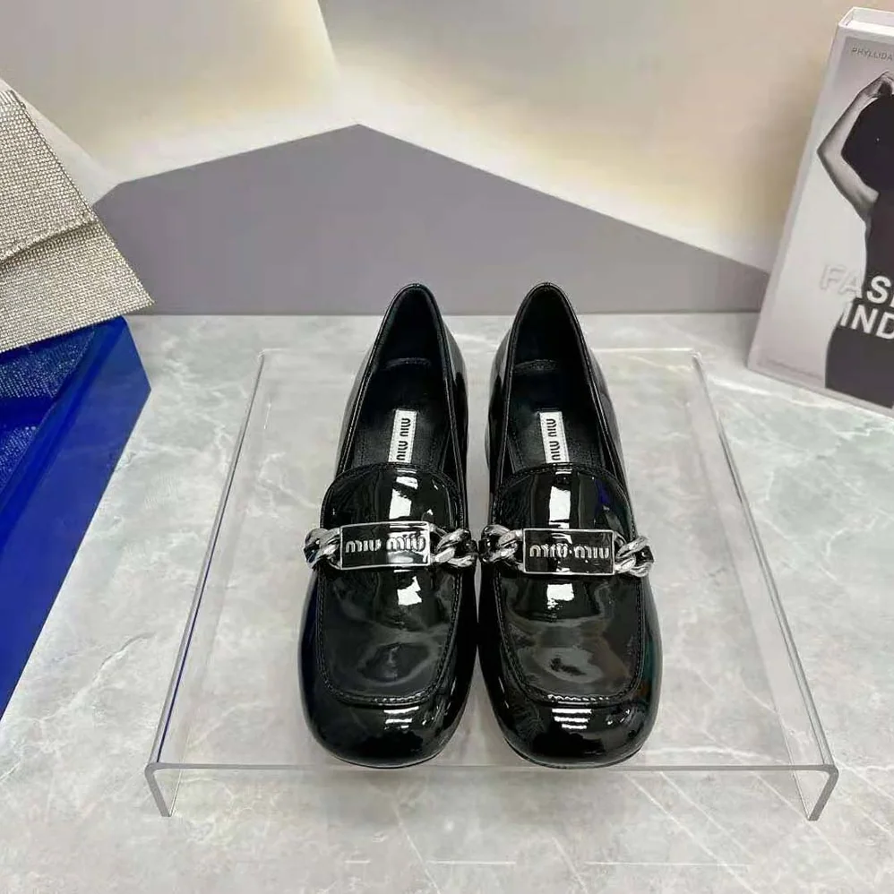 Miu Miu Patent Leather Loafers in 35 mm Heel Height for Women in Black