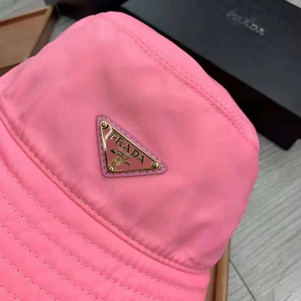 Prada Nylon Bucket Hat Decorated with the Triangle Logo for Women in Pink Prada Nylon Bucket Hat Decorated with the Triangle Logo for Women in Pink