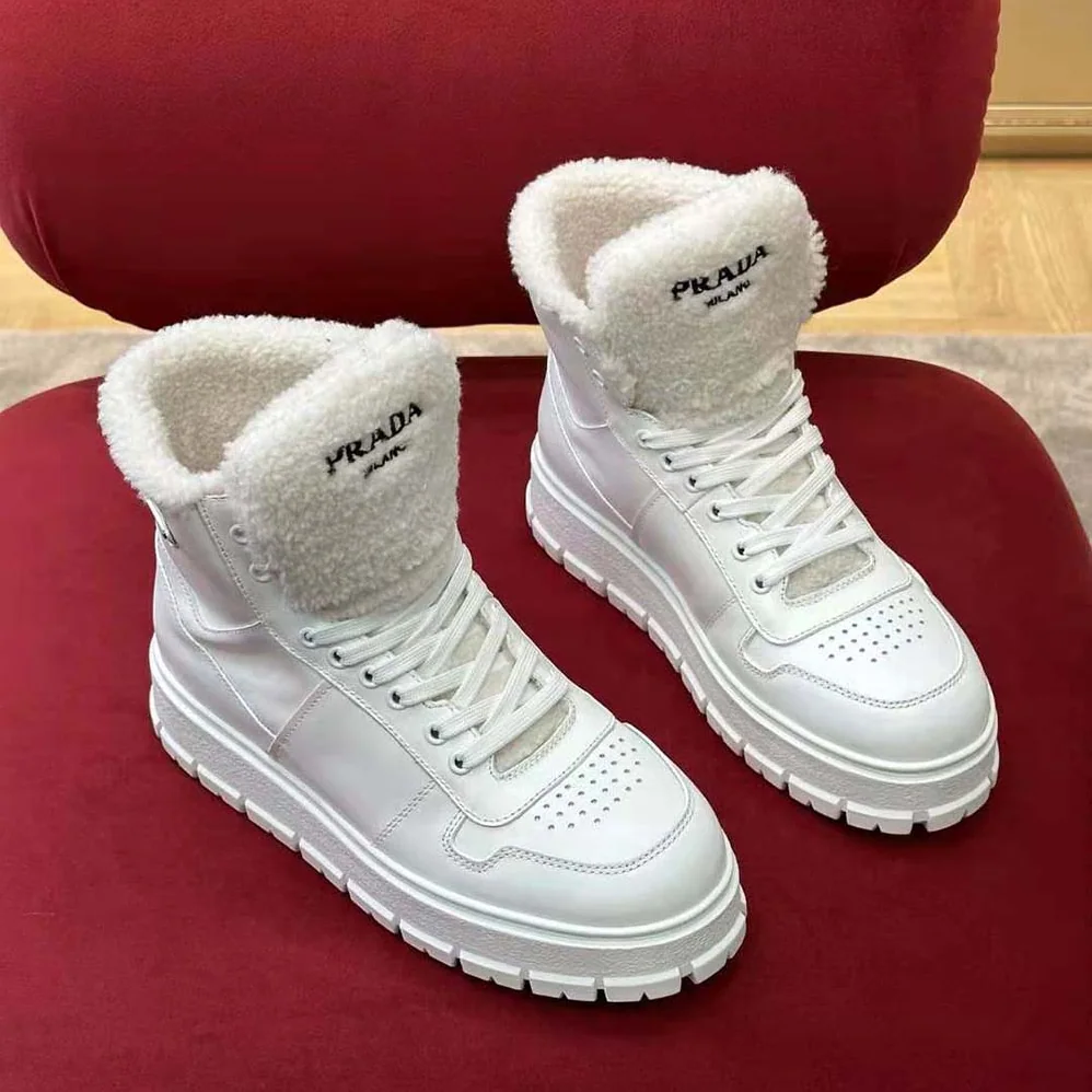Prada Leather and Shearling High-Top Sneakers for Women in White Prada Leather and Shearling High-Top Sneakers for Women in White