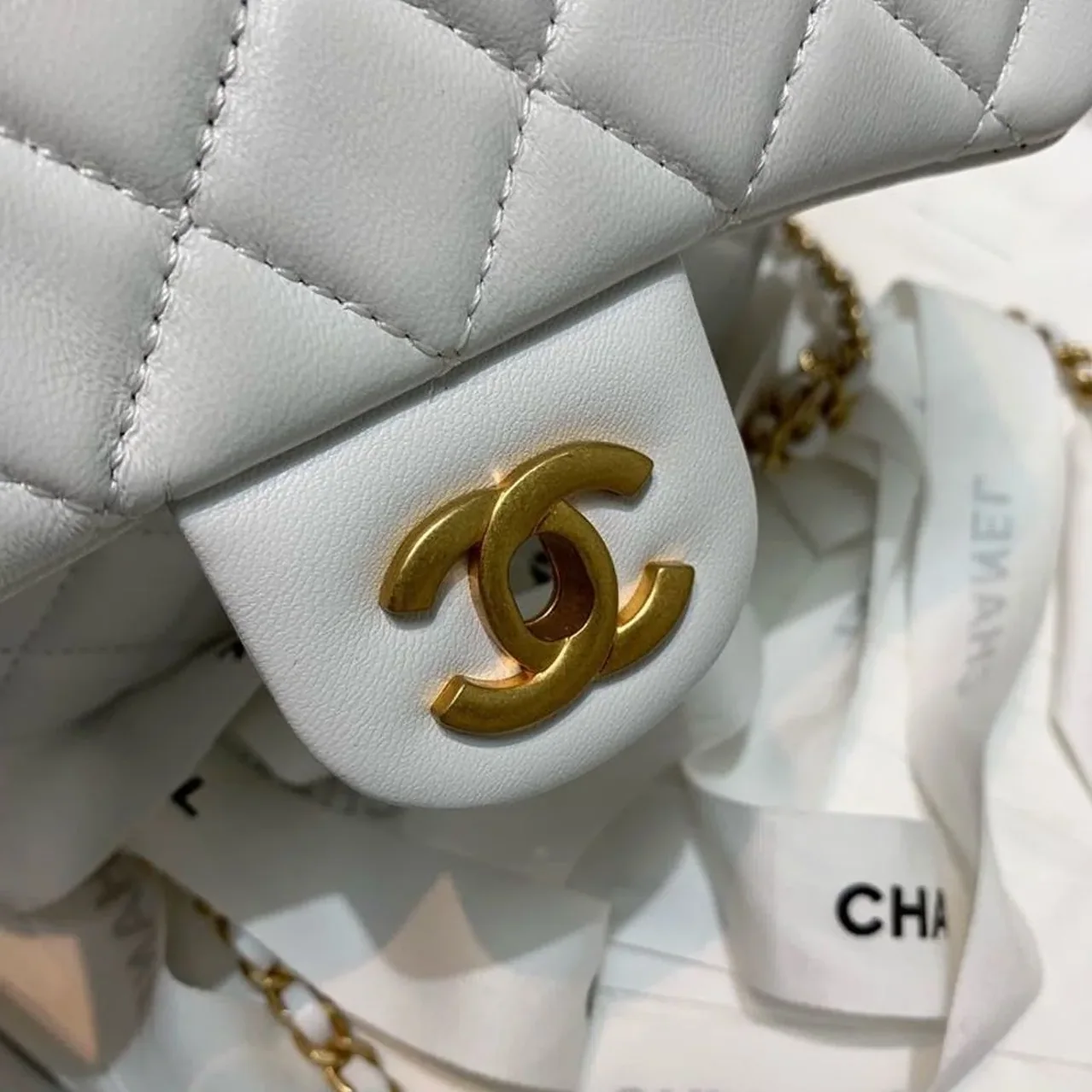 Chanel Flap Bag With CC Ball On Strap Mini Crossbody in White Gold Hardware Chanel Flap Bag With CC Ball On Strap Mini Crossbody in White Gold Hardware