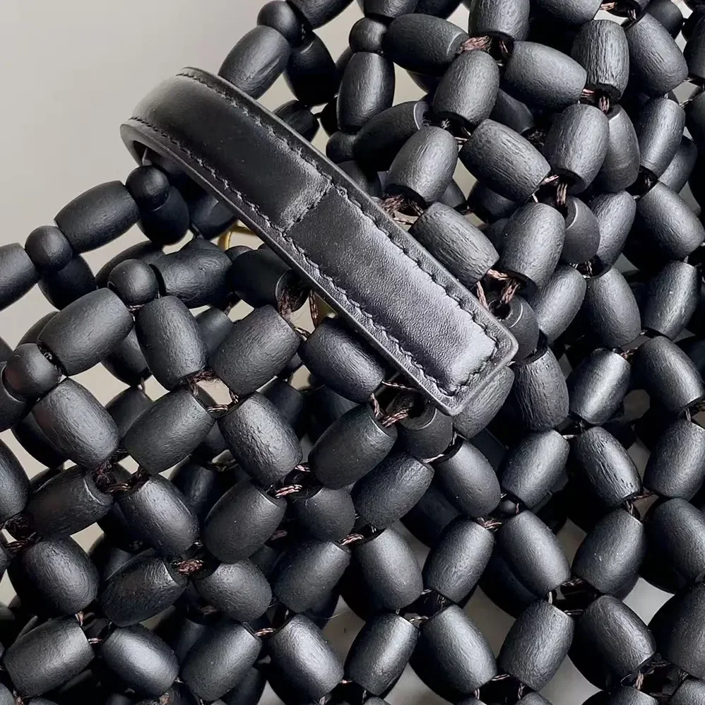 Saint Laurent YSL Le 5 À 7 In Wood Beads for Women in Black Saint Laurent YSL Le 5 À 7 In Wood Beads for Women in Black