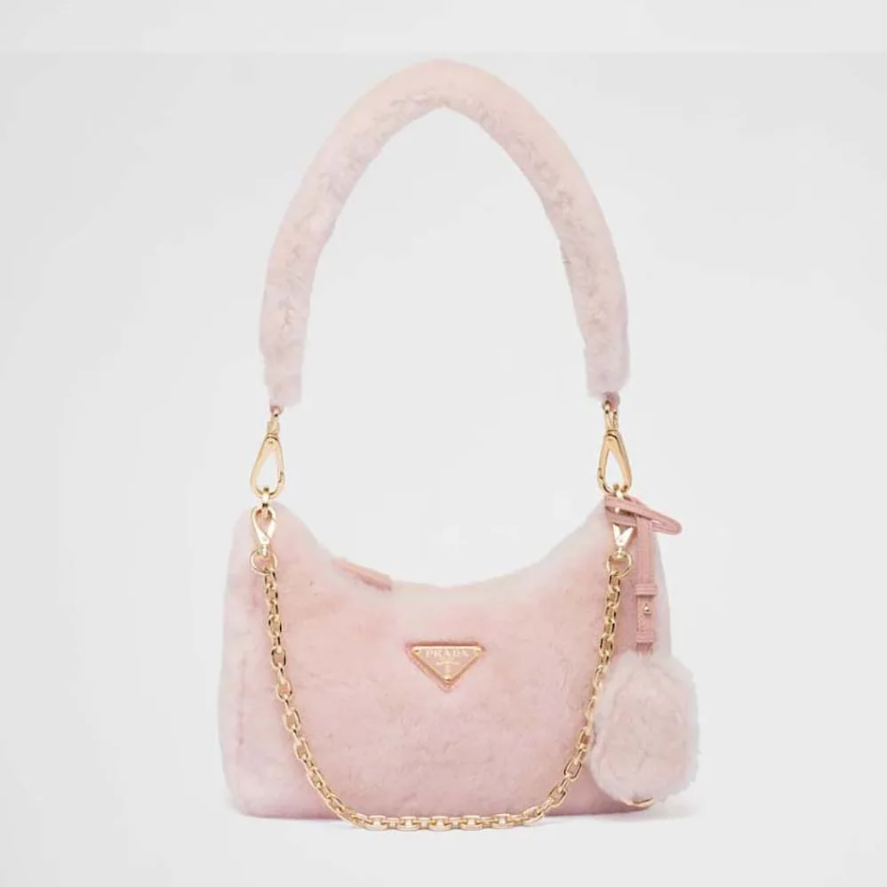 Prada Shearling Mini-Bag with the Enameled Metal Triangle Logo for Women in Pink Prada Shearling Mini-Bag with the Enameled Metal Triangle Logo for Women in Pink