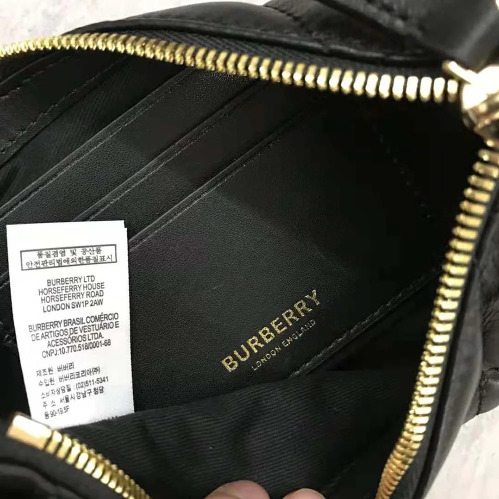 Burberry Quilted Lambskin Olympia Pouch for Women in Black Burberry Quilted Lambskin Olympia Pouch for Women in Black