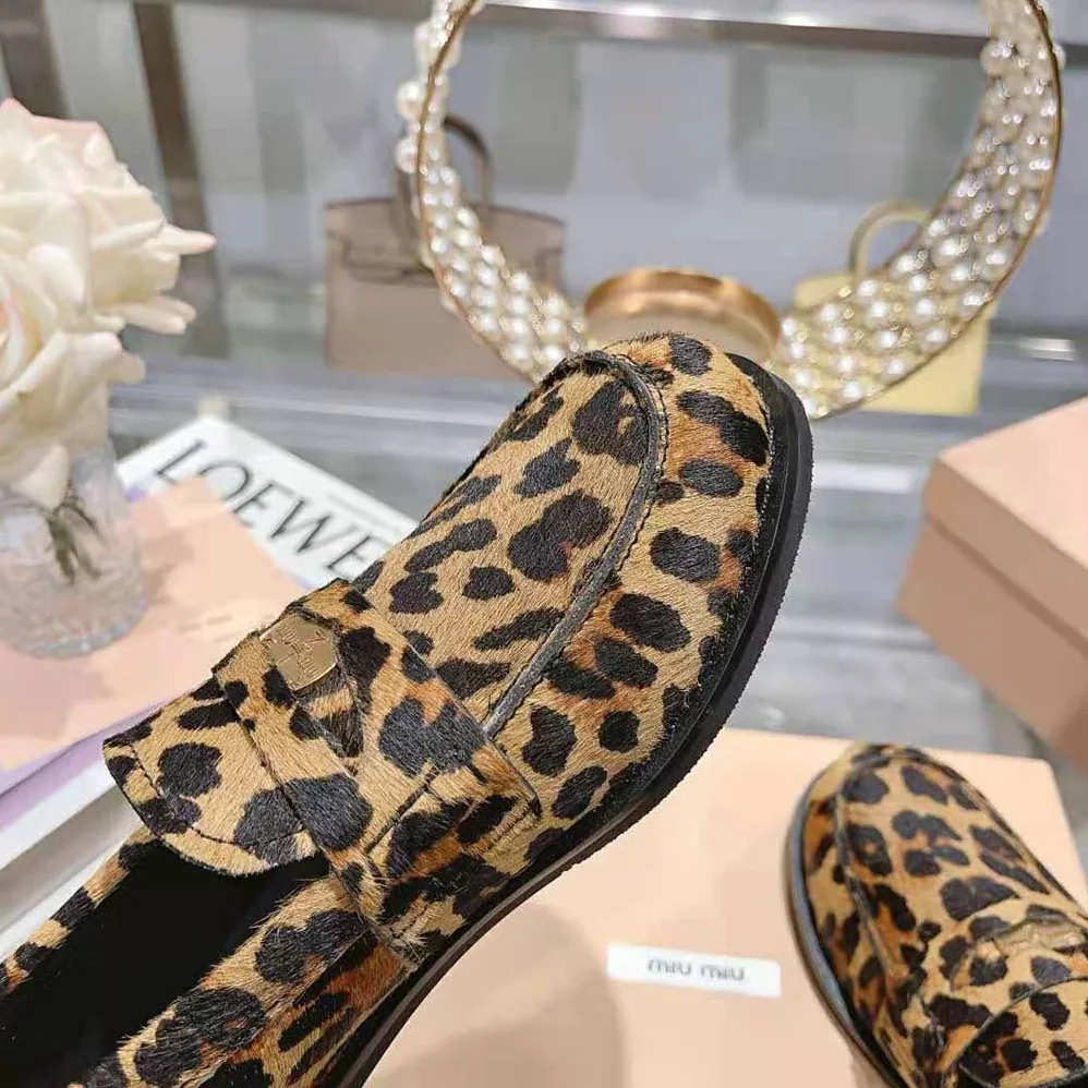 Miu Miu Leopard-print Calf Hair for Women in effect Loafers