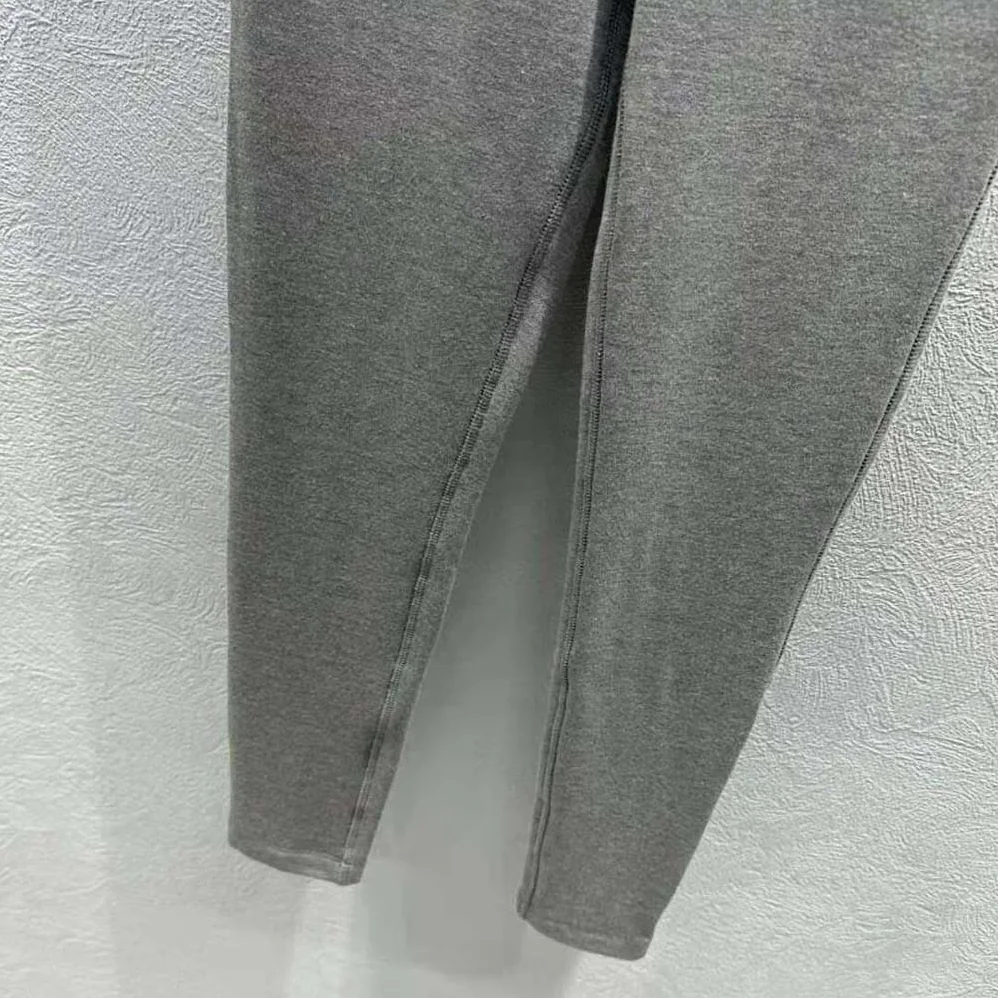 Miu Miu Silk Jersey Pants with Logo Patch for Women in Gray