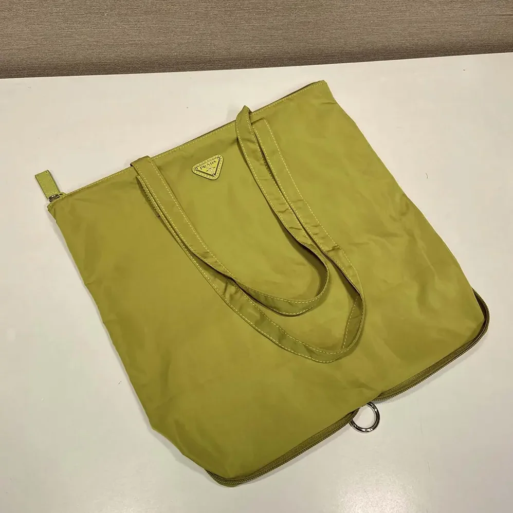 Prada Saffiano Leather Pendant With Re-Nylon Tote Bag for Women in Green Prada Saffiano Leather Pendant With Re-Nylon Tote Bag for Women in Green