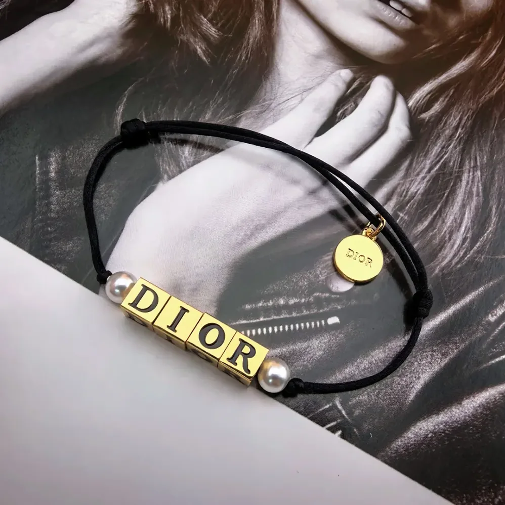 Dior D-Dice Bracelet Black Cotton and Lacquer with Gold-Finish Metal and White Resin Pearls for Women Dior D-Dice Bracelet Black Cotton and Lacquer with Gold-Finish Metal and White Resin Pearls for Women